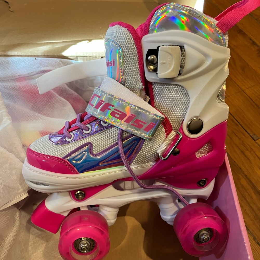 Girls size small Cifaisi expandable light up roller skates- lightly used